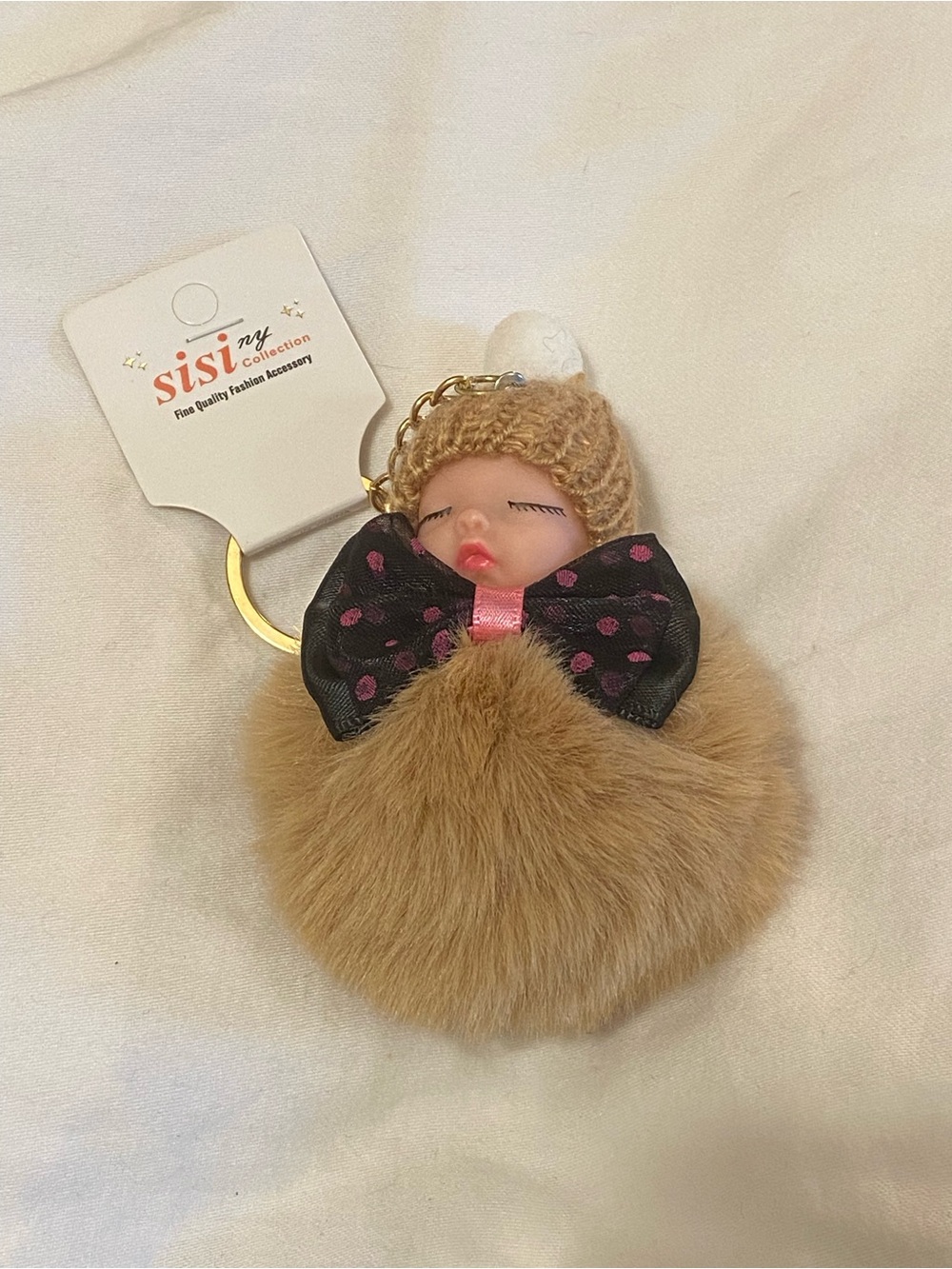 Sisi NY Collection Sleeping Baby Pom Pom Keychain/Bag Charm